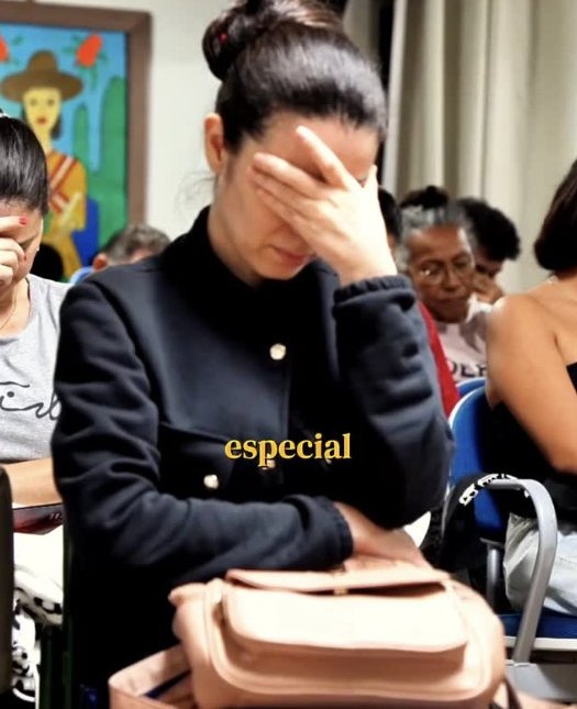 Participante emocionada durante a palestra
